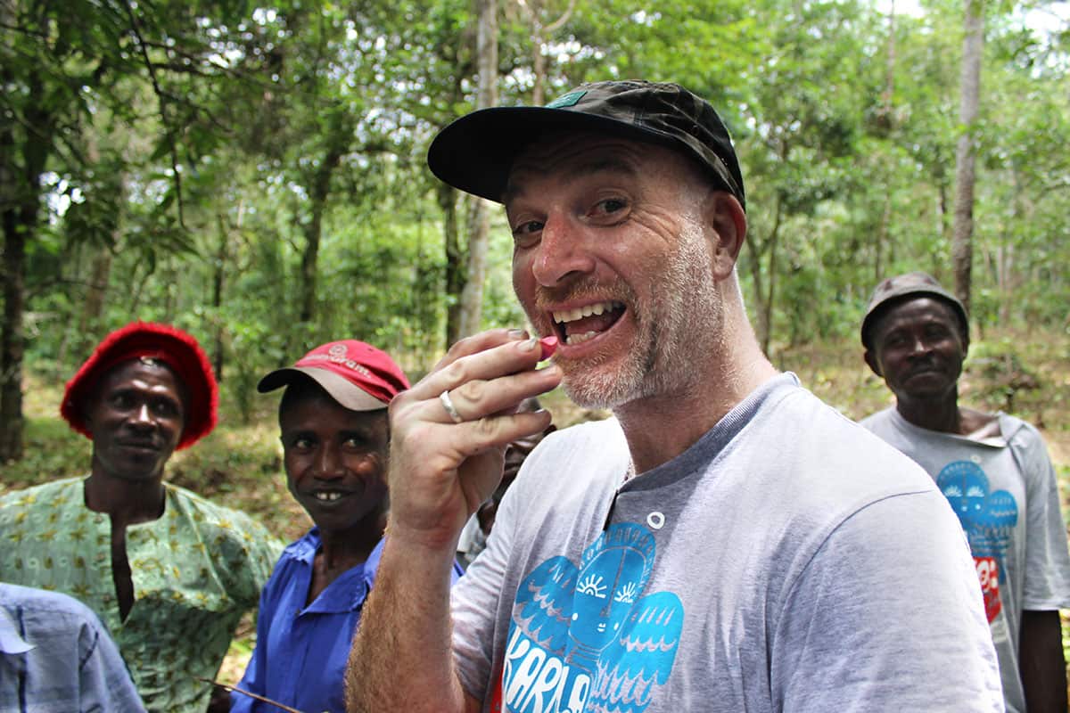 Simon Coley trying a cola nut 