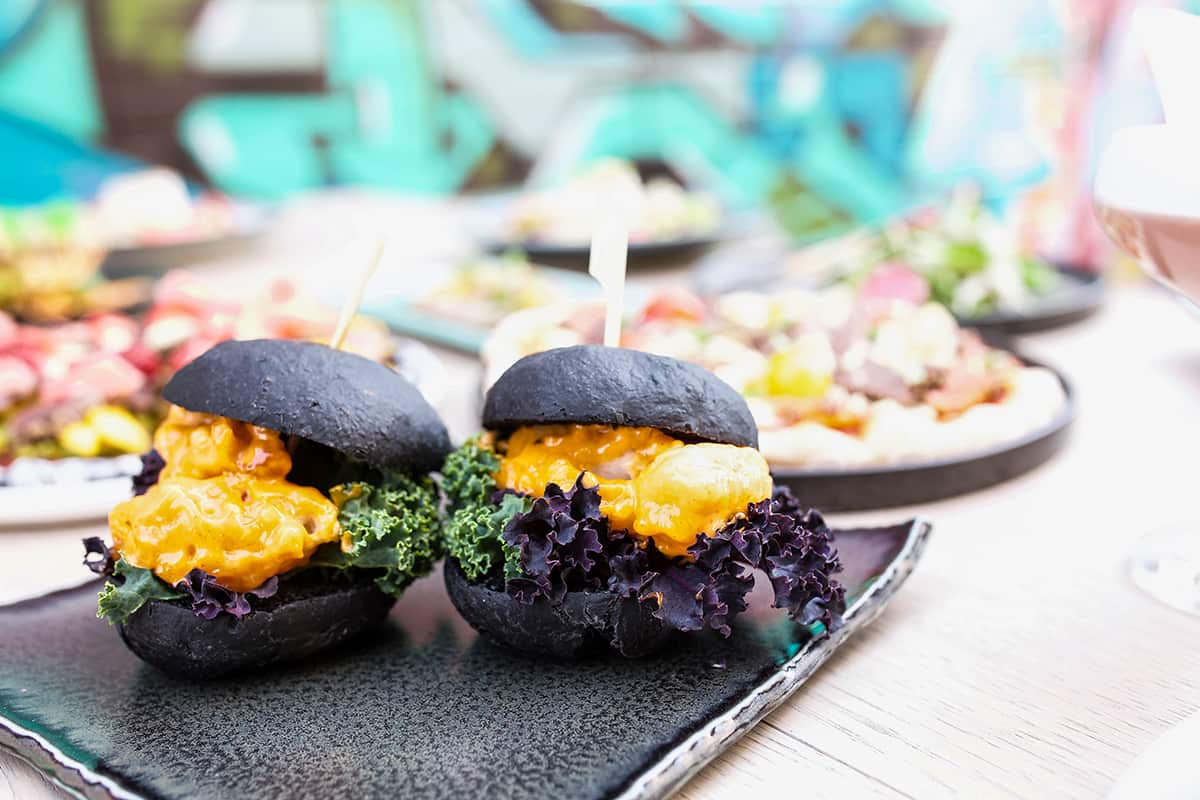 Chilli mayo prawn sliders arrive crisp and creamy.