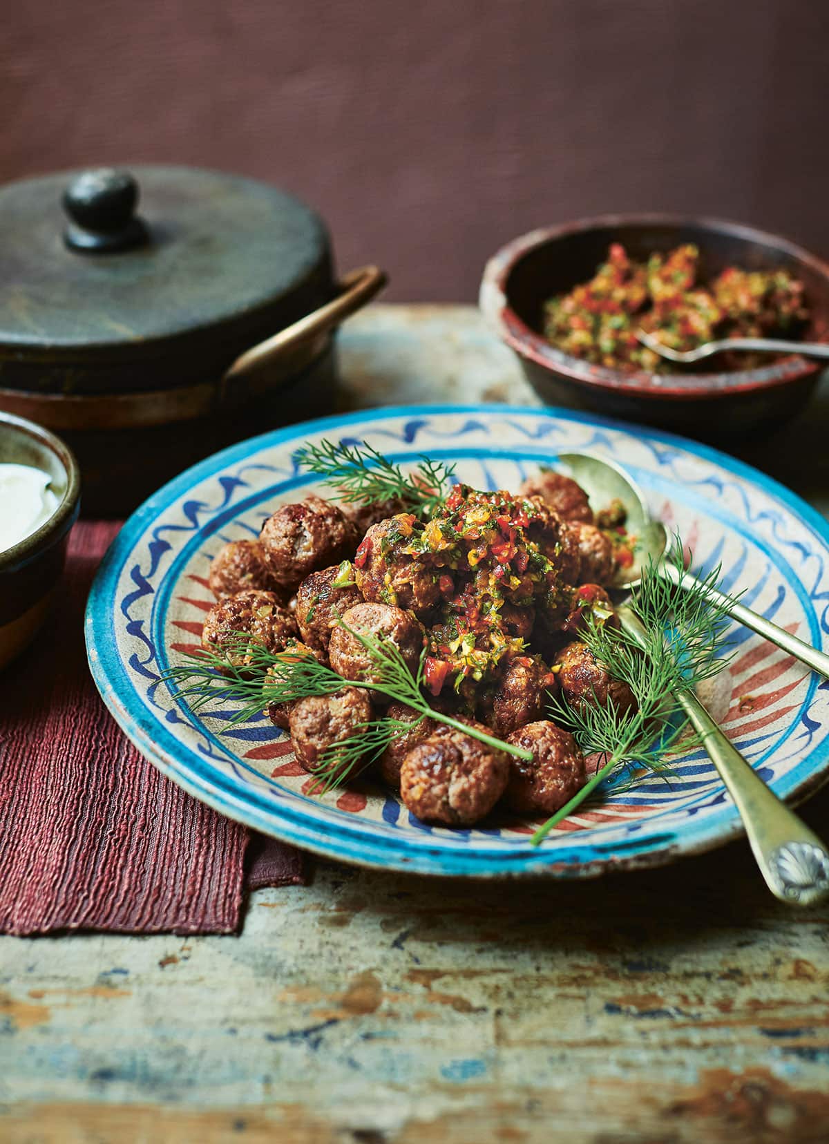 Spicy meatballs with adjika and yoghurt