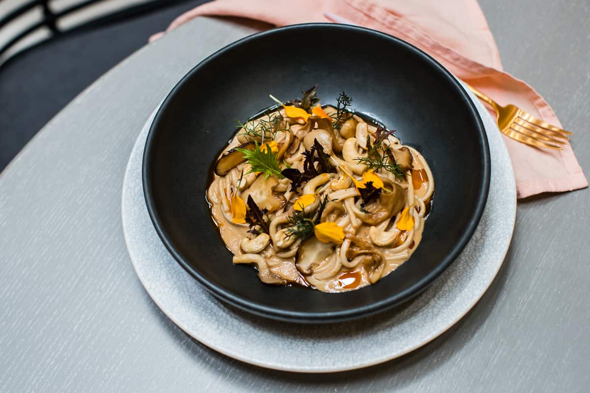 Spicy Udon. Sichuan Tempeh, Shiitake Mushroom, Red Mustard, Toasted Cashew, Togarash.i