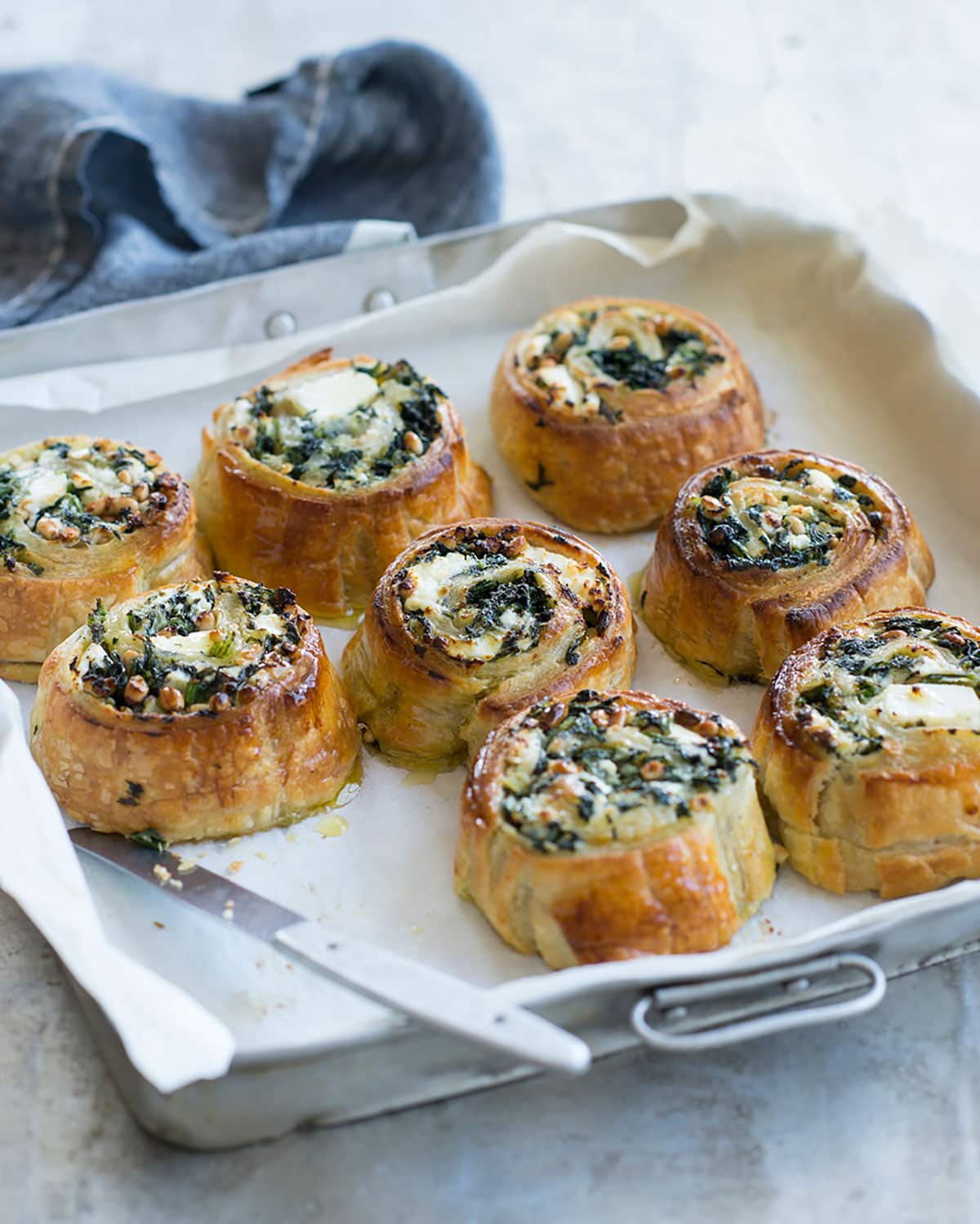 Spinach and pine nut rolls
