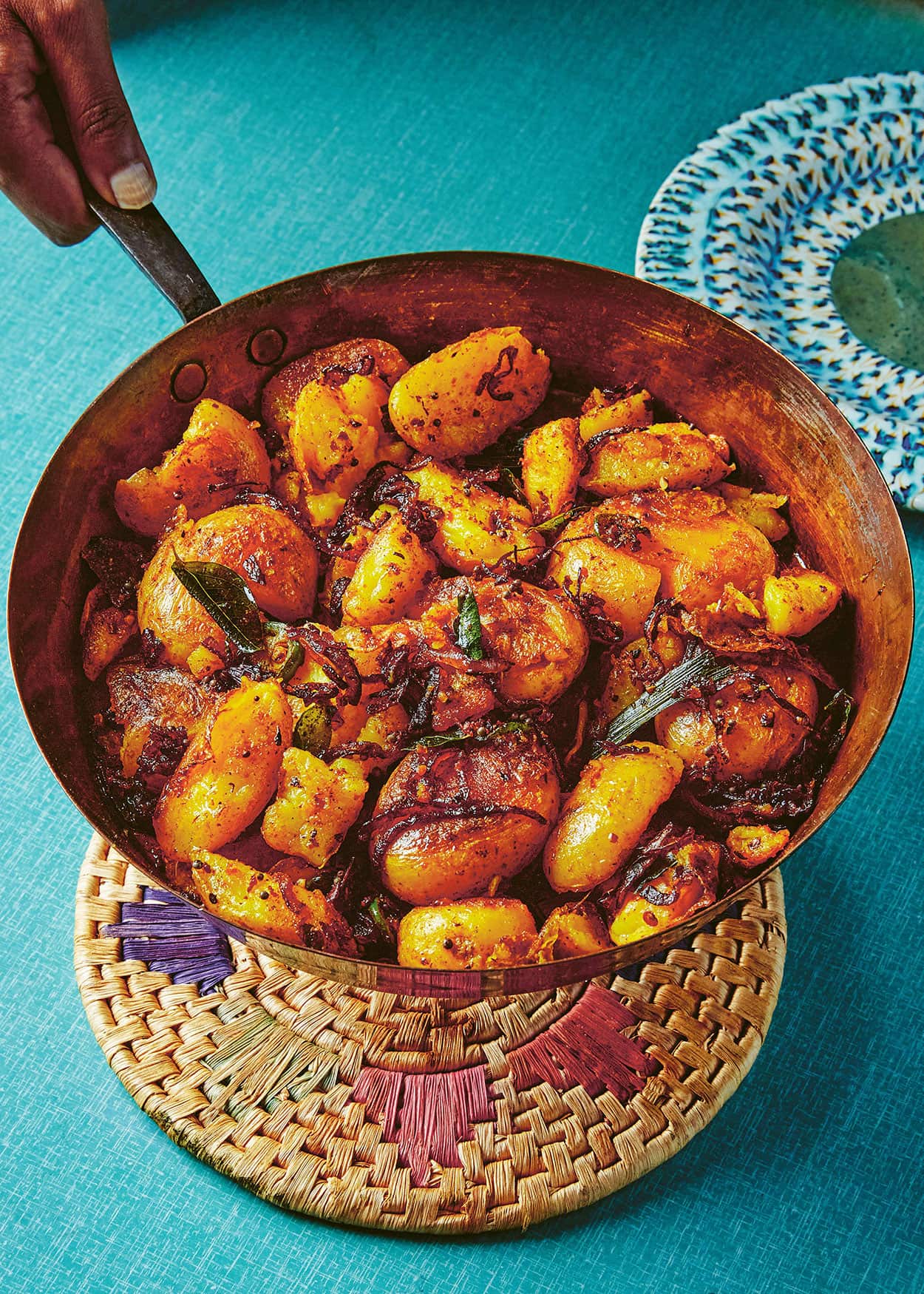 Tempered crunchy fried potatoes with turmeric
