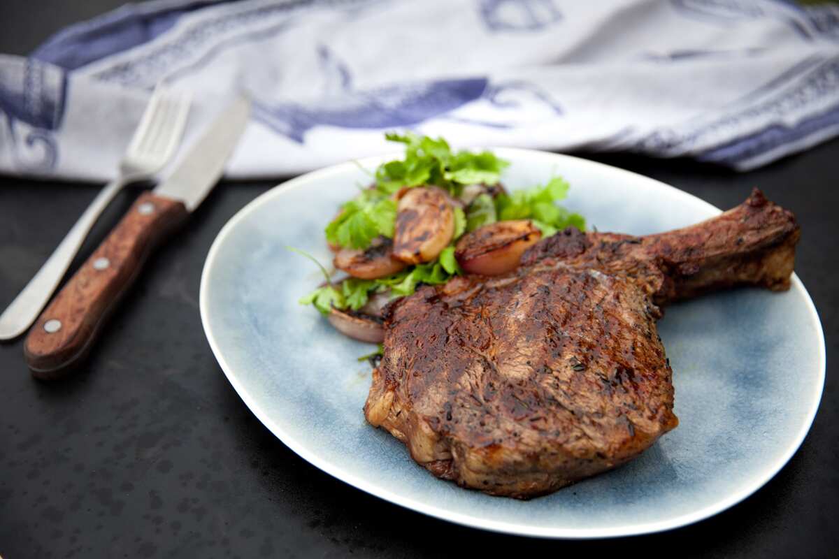 Rib eye with charred onion salad