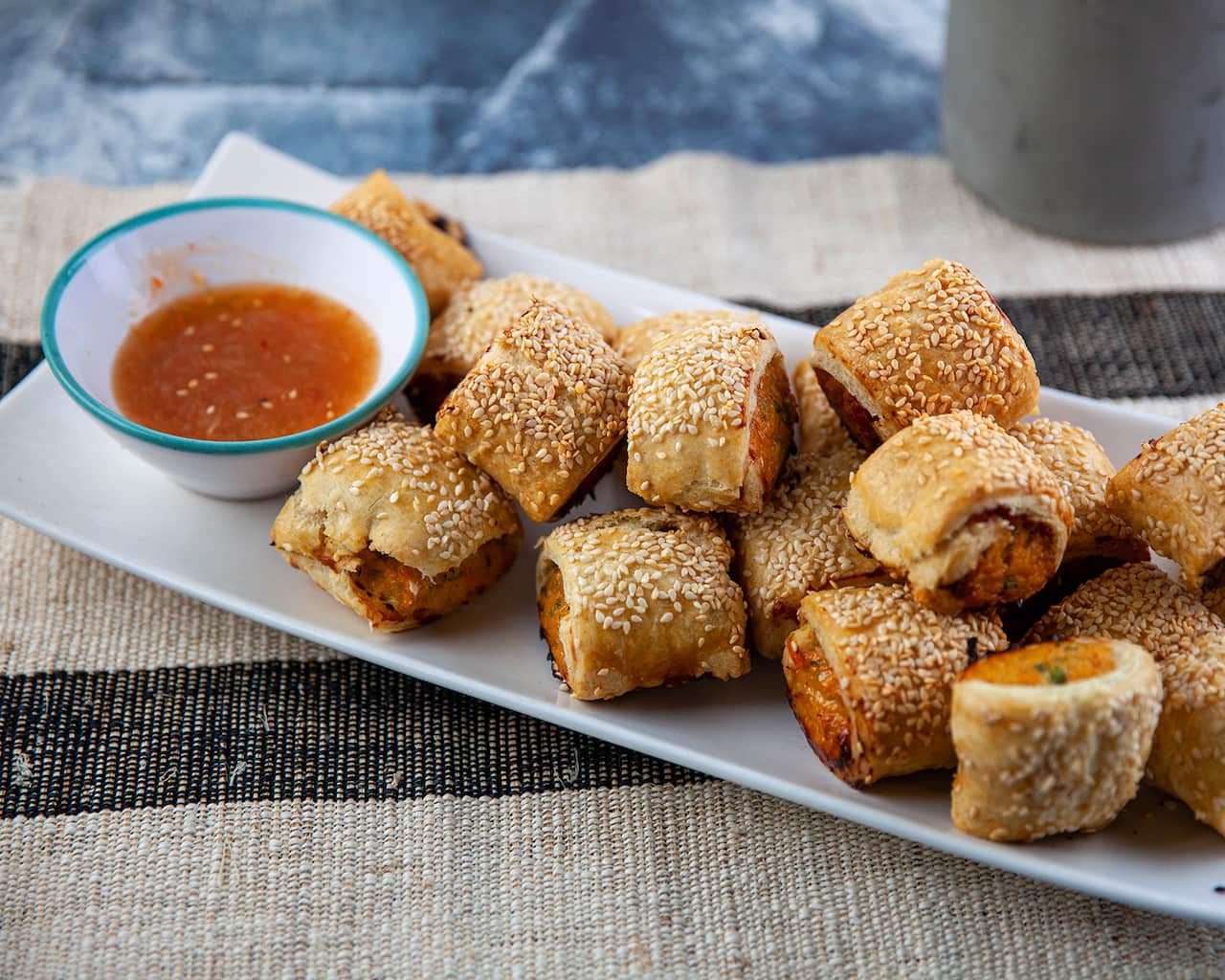 Gluten-free Thai chicken sausage rolls with sweet chilli dipping sauce