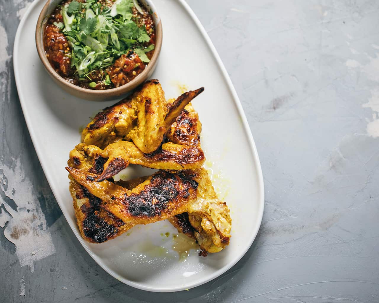 Turmeric coconut chicken with nahm jim jaew