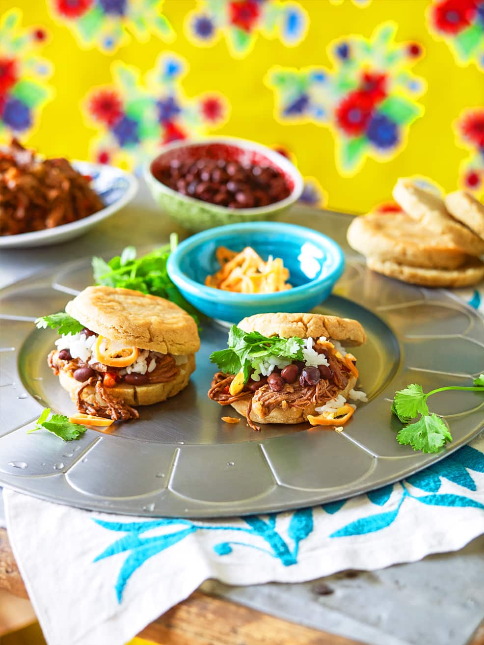 Corn cakes stuffed with shredded beef, black beans and rice (arepas rellenas)