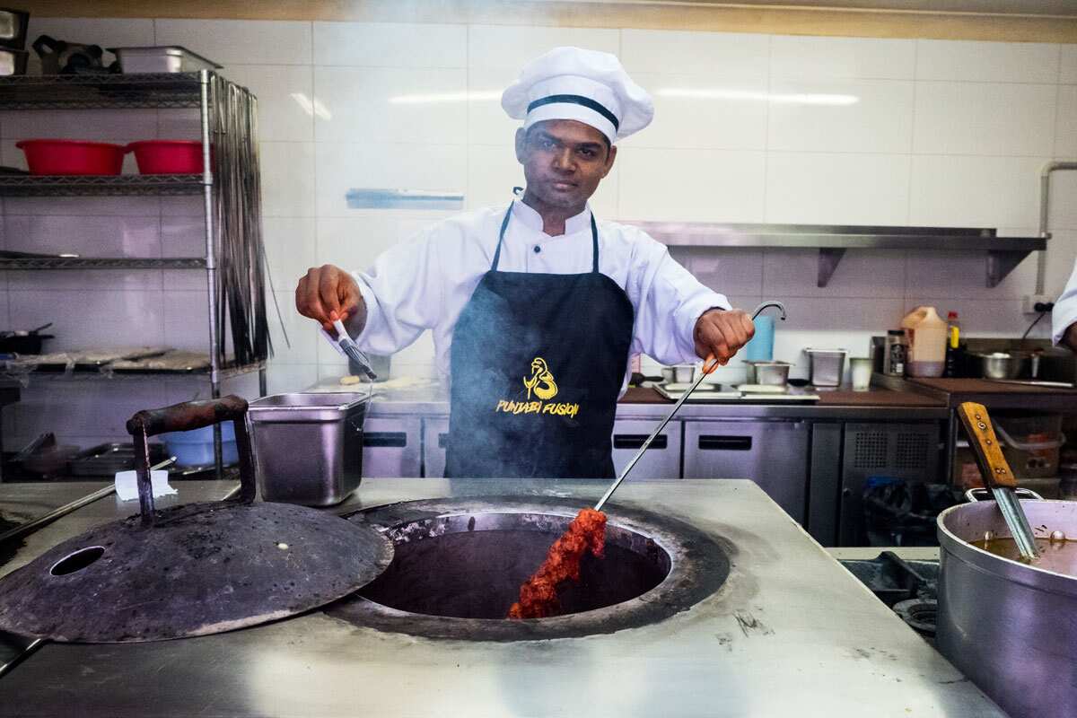 The tandoor gets a good workout, cranked to 400 degrees to give meats their smokiness.