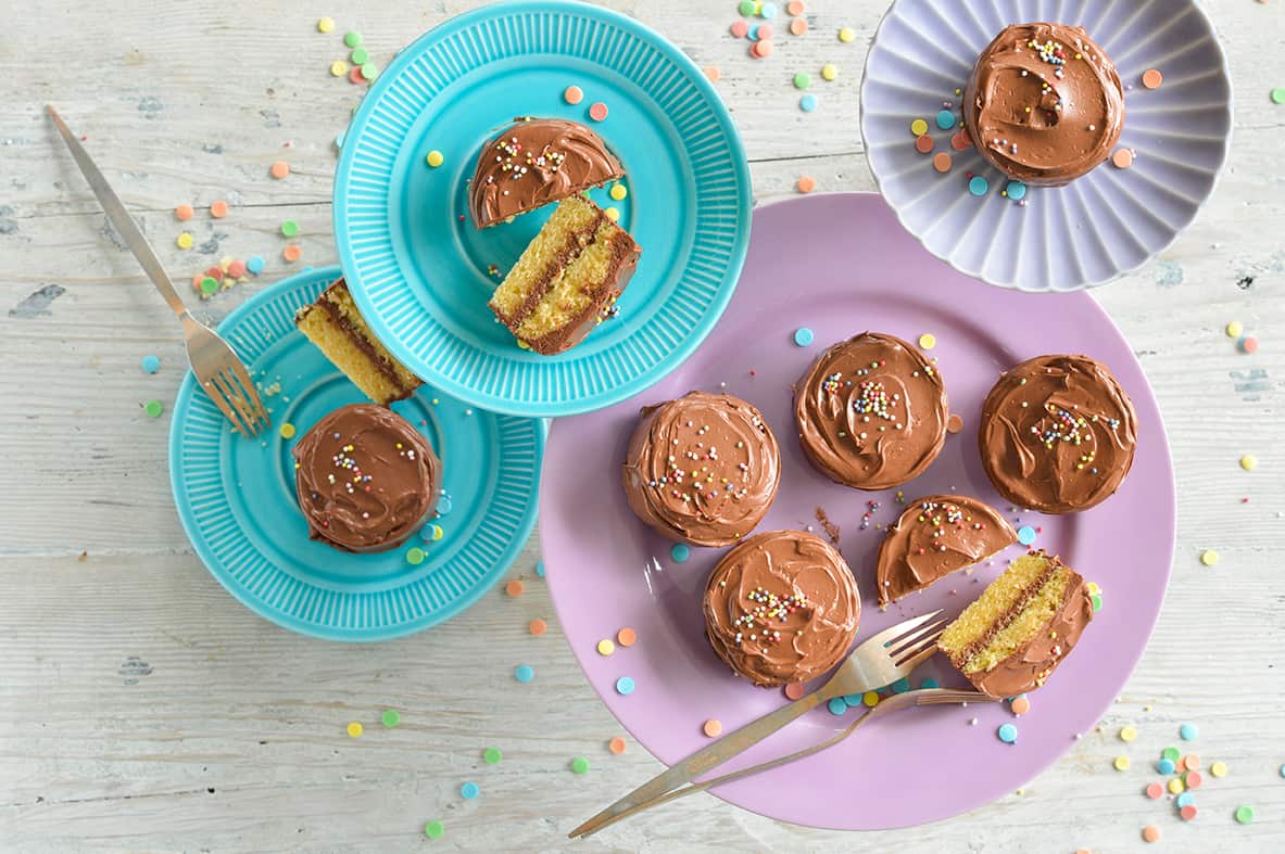 Yellow cakes with chocolate fudge frosting