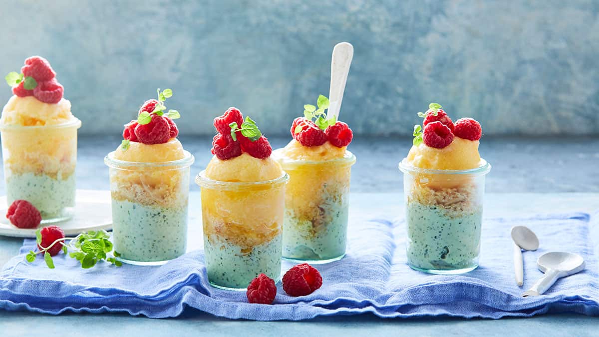 Yellow peach and mint ice-cream cups with crunchy crumbs