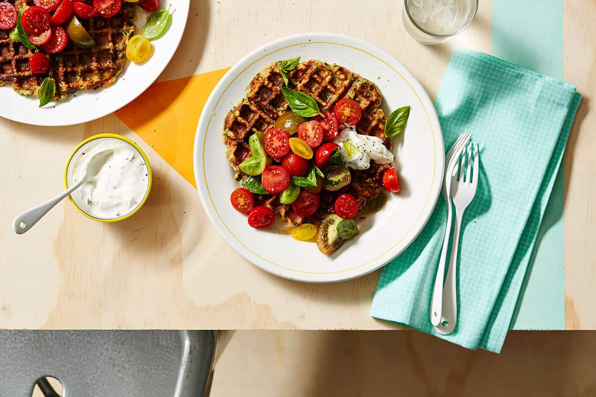Zucchini waffles with cherry tomato salsa and dill yoghurt