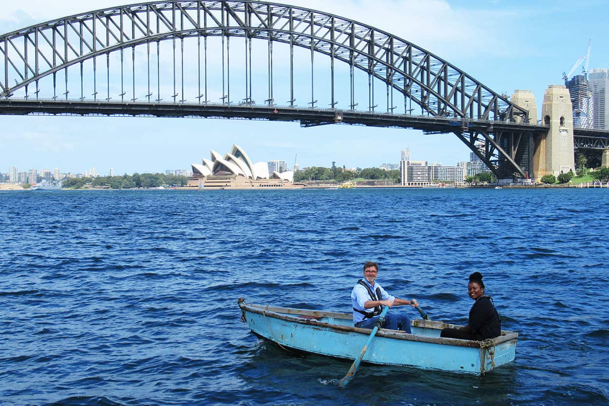 North Sydney Council historian Ian Hoskins and Our African Roots host and co-producer Santilla Chingaipe on the trail of African-American convict Billy Blue who became Sydney harbour’s first licensed ferryman.