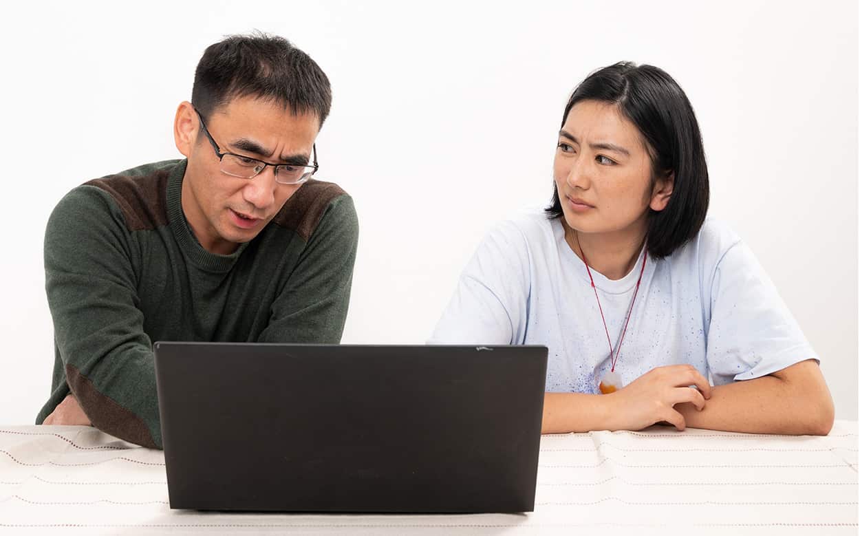 Gang Du and Lisa Zhang in cast gallery image from