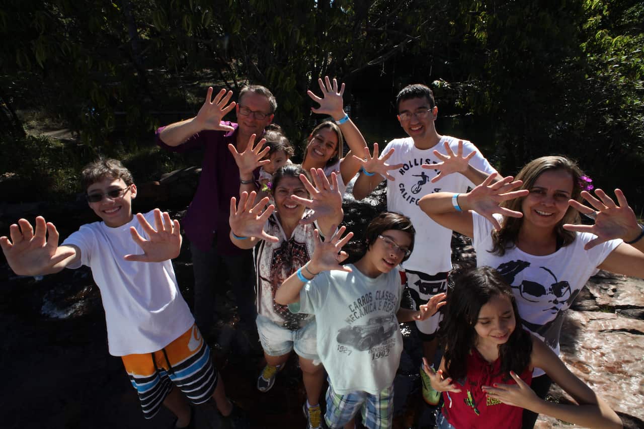 Michael Mosley with the Da Silva family who have an extra finger on each hand.