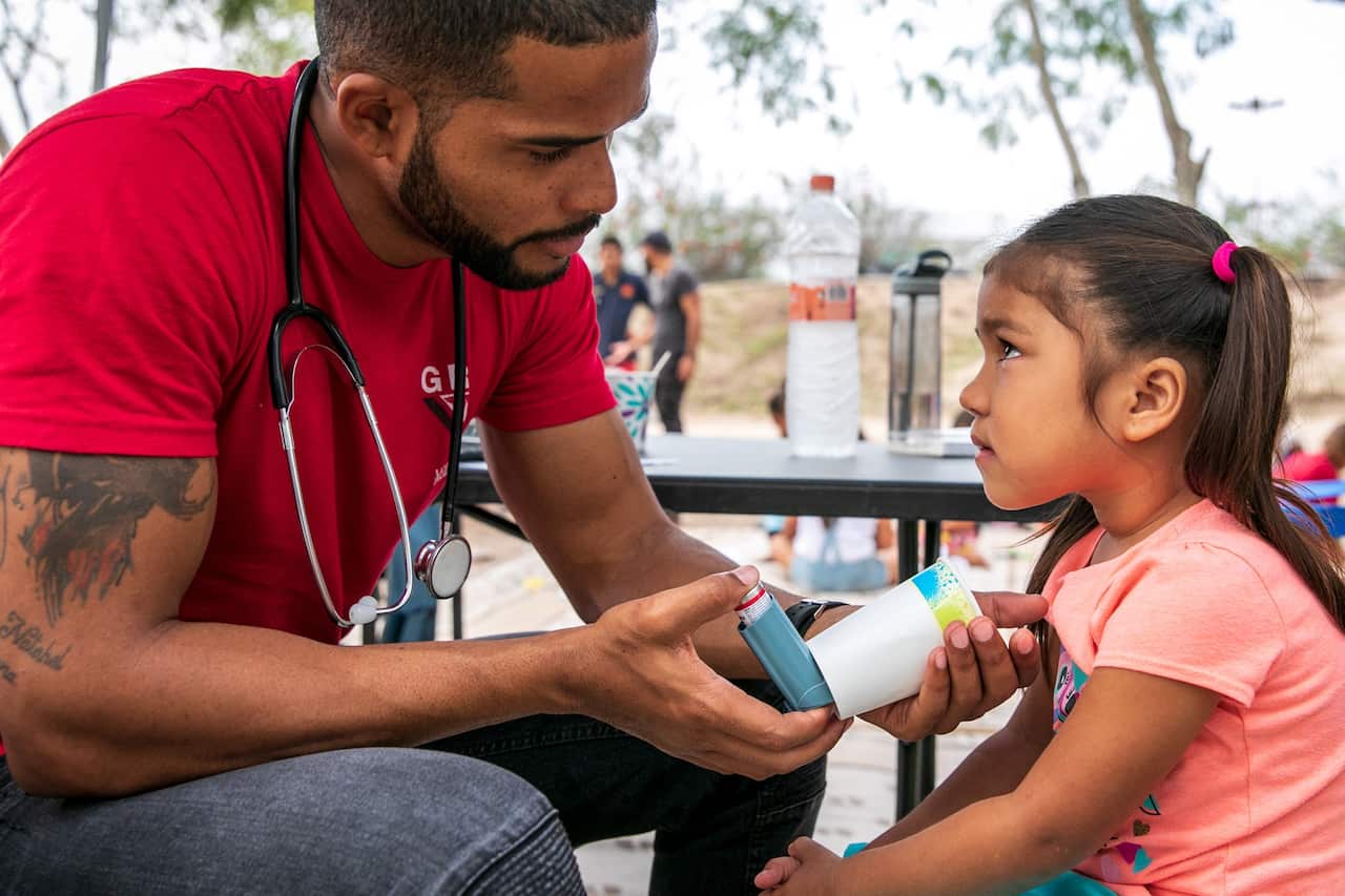 Dr. Elisondo treated Estephanie, 4, for asthma at the camp.