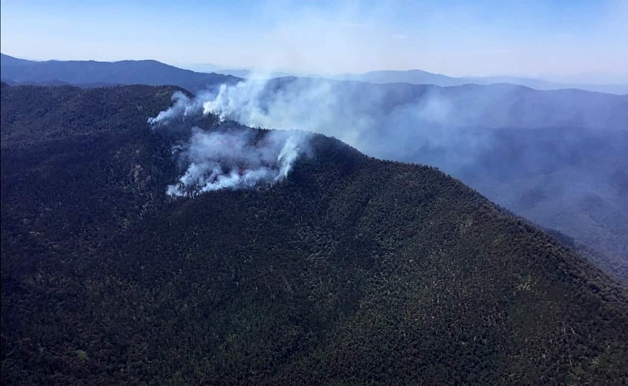 A fire burning on Mount Buggery above the Buffalo River in the alpine region of Victoria.
