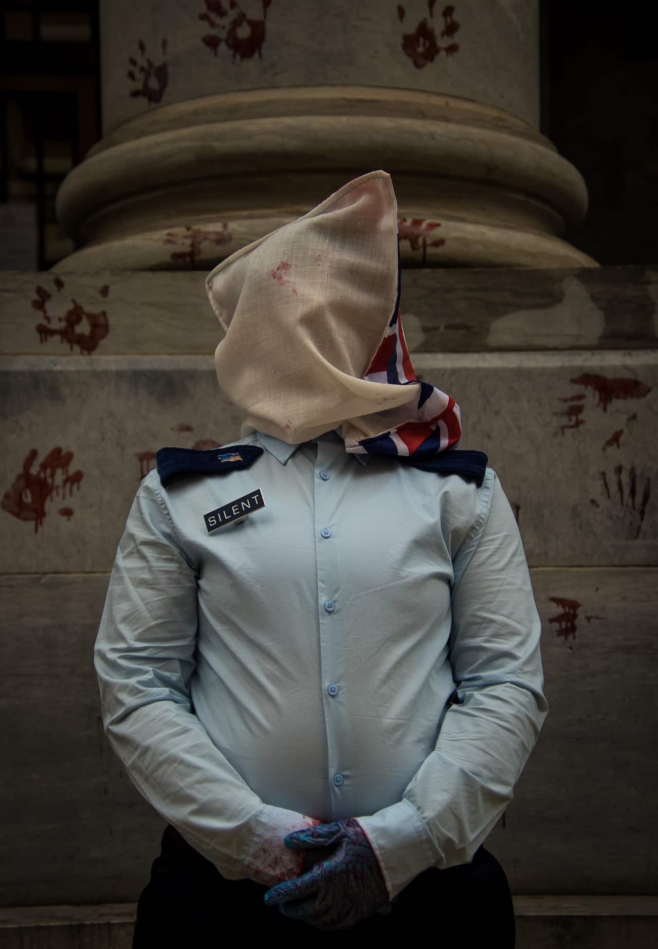 Action calling for a national ban on spit hoods.