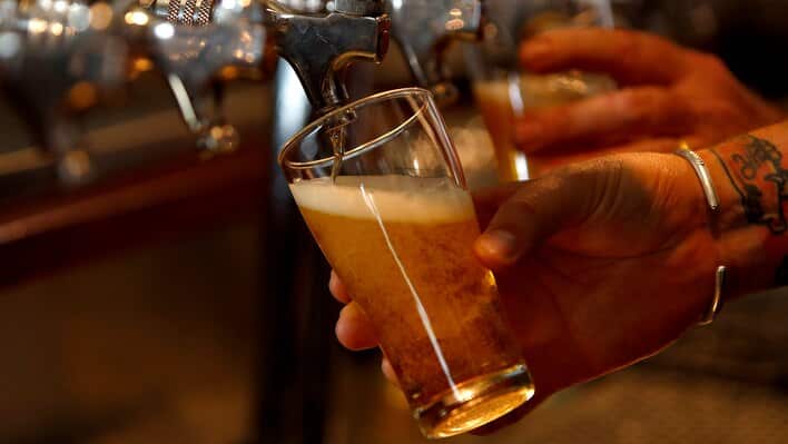 A beer is poured at a Sydney brewery.