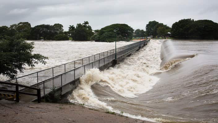 Floodwaters are seen at Aplins Weir in Townsville, Friday, February 1, 2019. Townsville residents are again being told to leave their homes as north Queensland's flood disaster rolls on. (AAP Image/Andrew Rankin) NO ARCHIVING