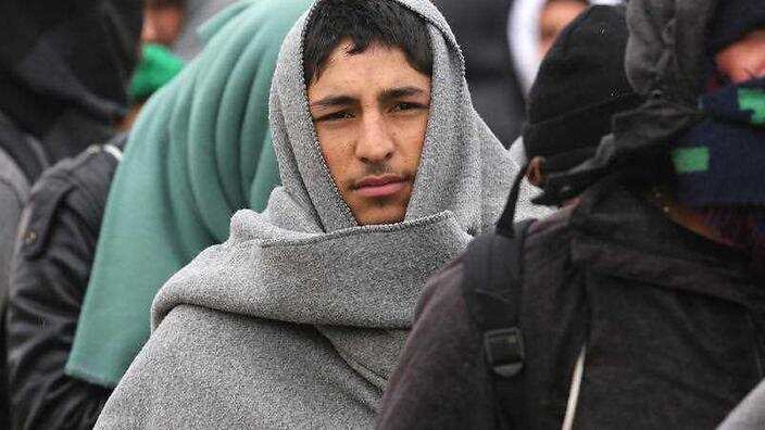 Refugees on their way to Germany stop at the camp in Opatovac.