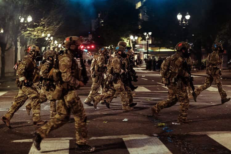 Federal Agents Envelop Portland Protest, and City’s Mayor, in Tear Gas