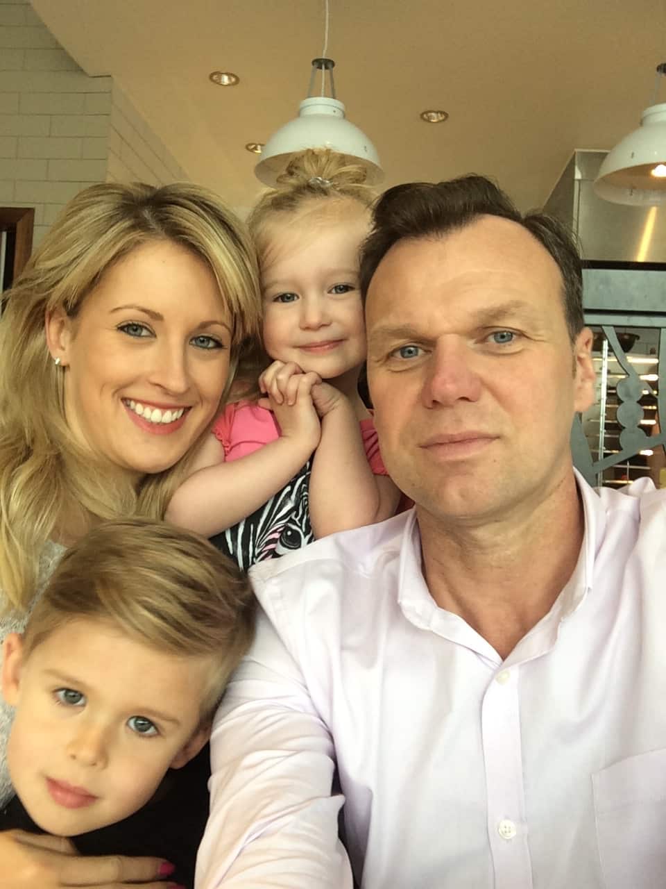 Andrew Drury with his wife and two kids