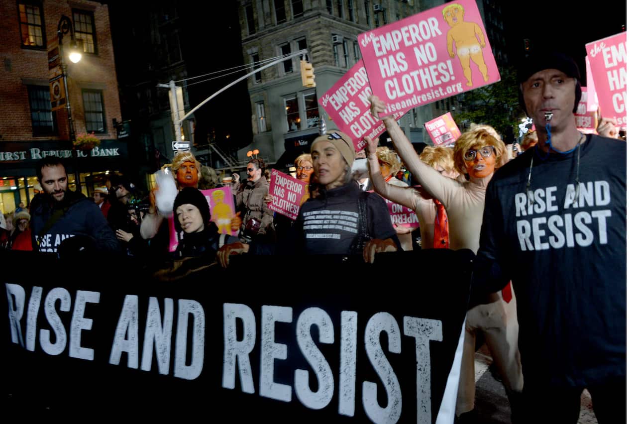 People participate in the Village Halloween parade in New York City, NY, USA, on October 31, 2017.