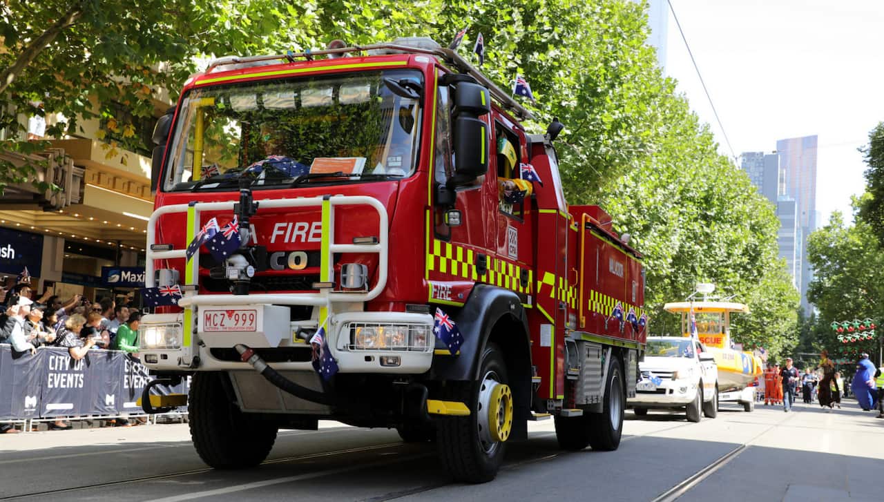 A Country Fire Authority truck from Mallacoota leads the pack in Melbourne.