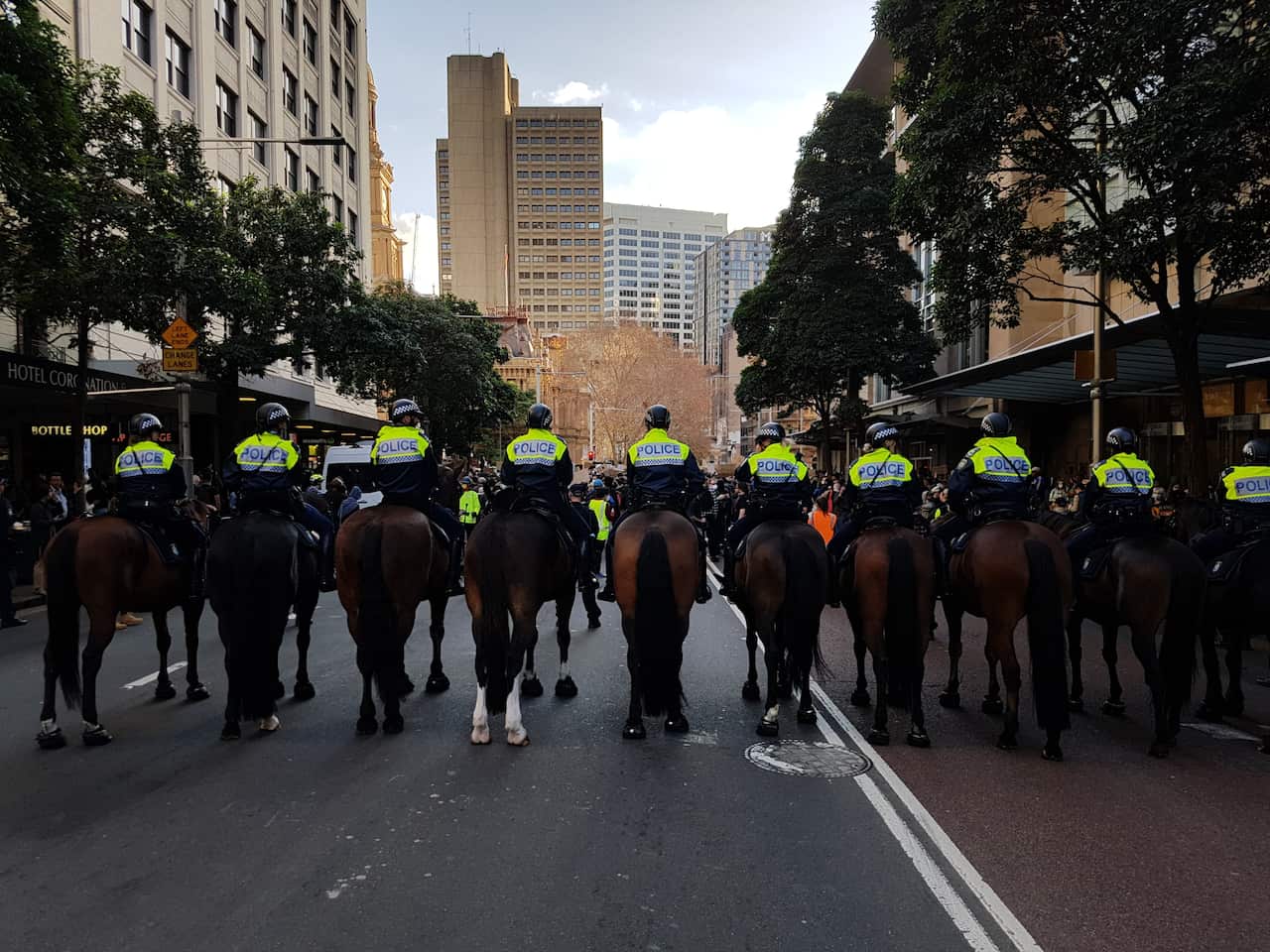 Police on horseback monitor the crowd. One man, who was shouting "all lives matter" was taken away in handcuffs and later released. 