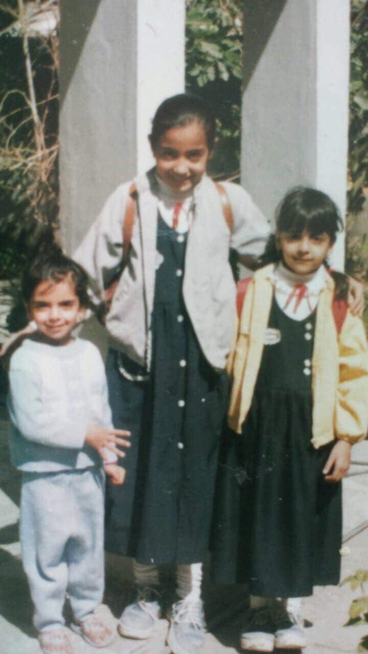 Hadeel as a young girl with her siblings in Iraq.