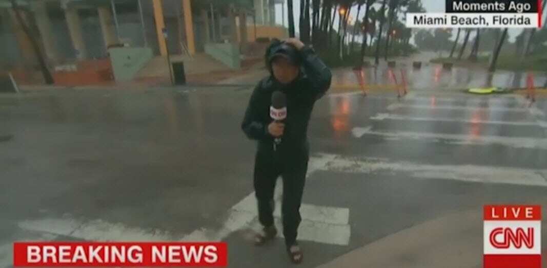 CNN's Kyung Lah braves the winds of Hurricane Irma and is nearly hit by a falling street sign.