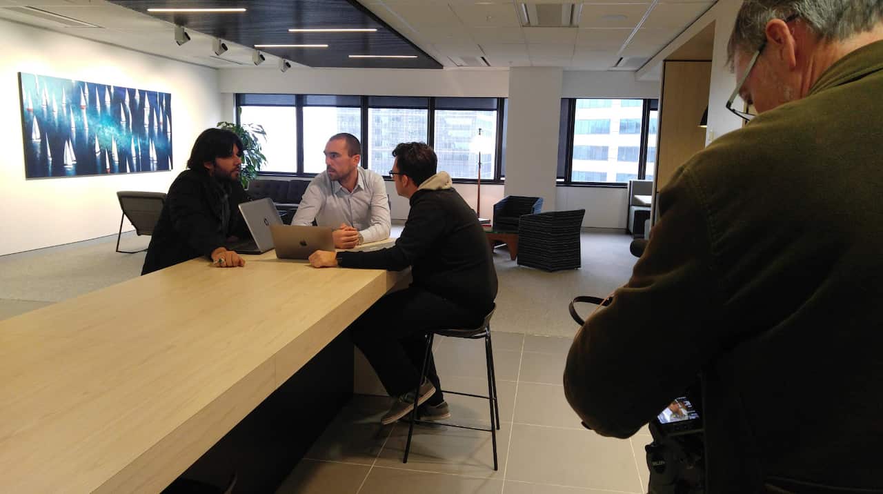 Sylvain Mansotte (centre) with his team.