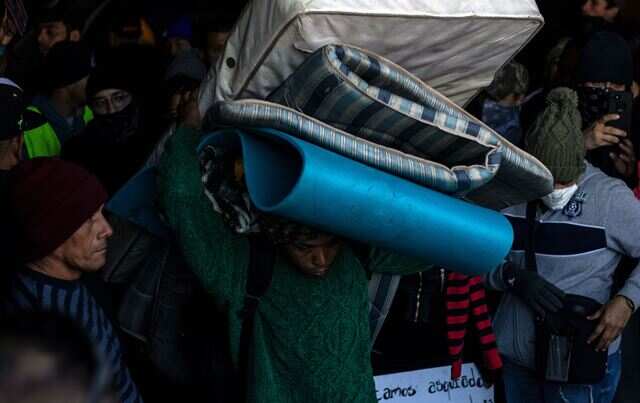 Central American migrants traveling to the United States staying at a shelter in downtown Tijuana