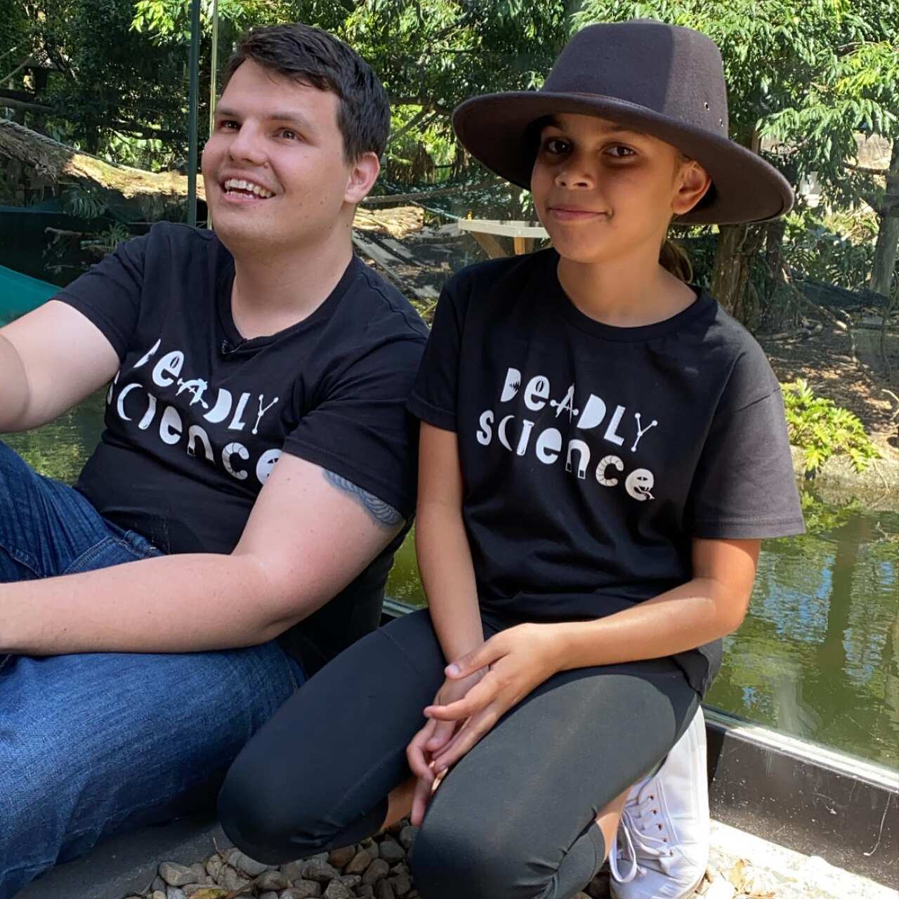 Corey Tutt (L) with a young girl from Redfern Youth Connect during a recent outing to Taronga Zoo.
