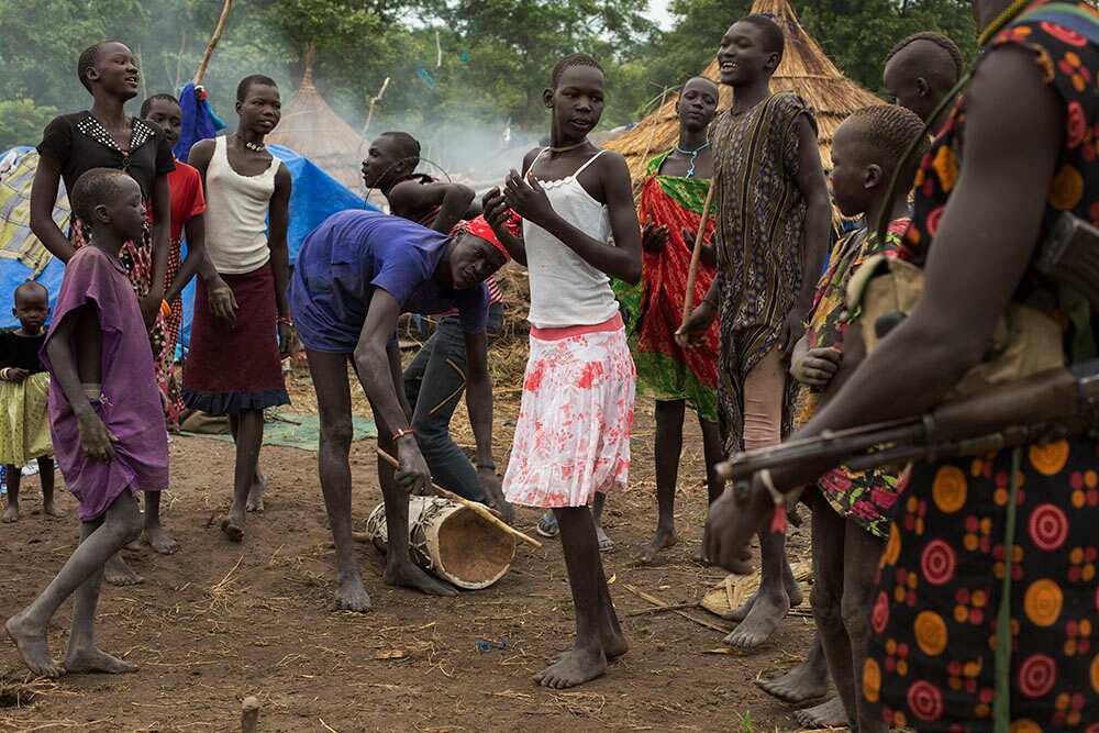 The tribe celebrates after a wedding dowry is negotiated and decided. (Matthew Abbott)