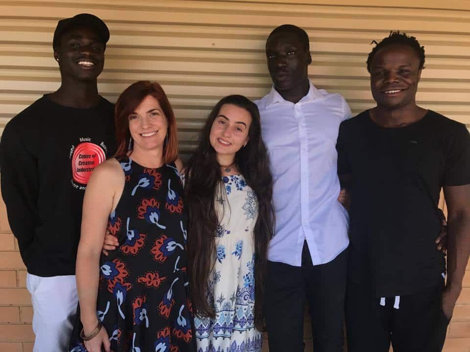 Joel (second from right) with his brother Emmanuel (far right), cousin Patrick (far left), teacher Kirsten Beletich( second left) and classmate Ivanya