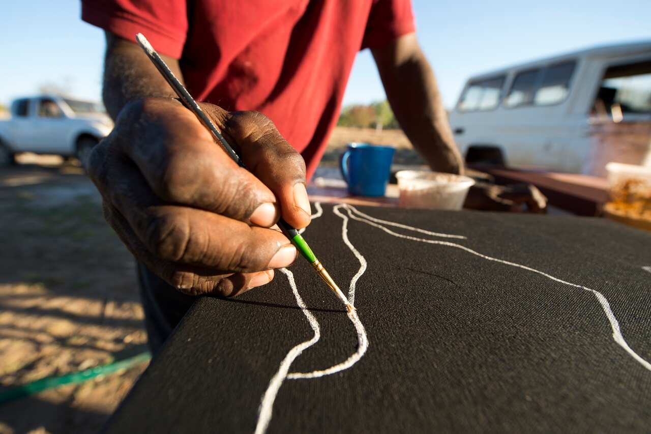Lindsay Malay painting at the Warmun Art Centre.