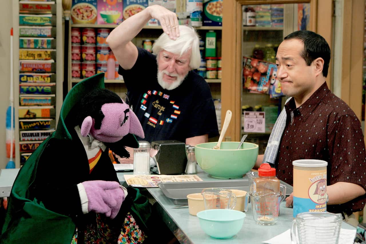 Spinney in 2004, with the Count and Alan Muraoka.