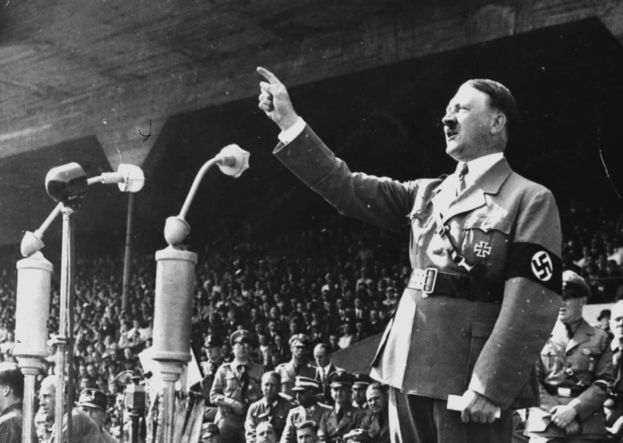 Adolf Hitler gestures during a speech in May 1937.