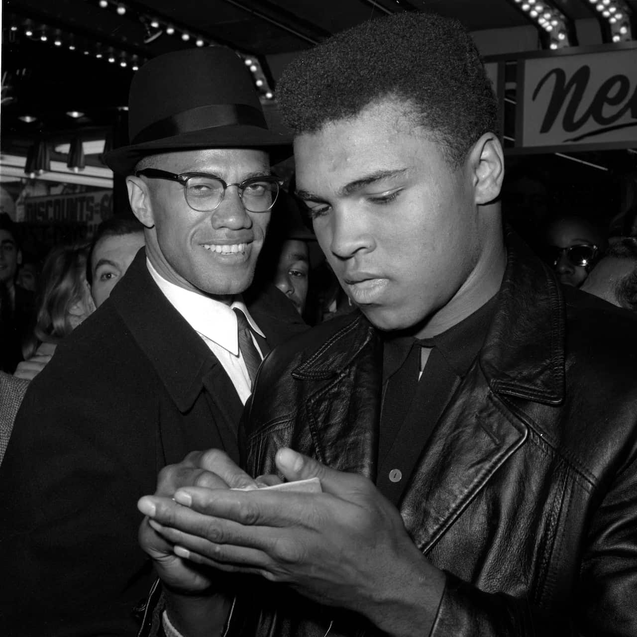 World Heavyweight Boxing Champion Muhammad Ali, right, with black Muslim Leader, Malcolm X, in New York City, 1 March, 1964.