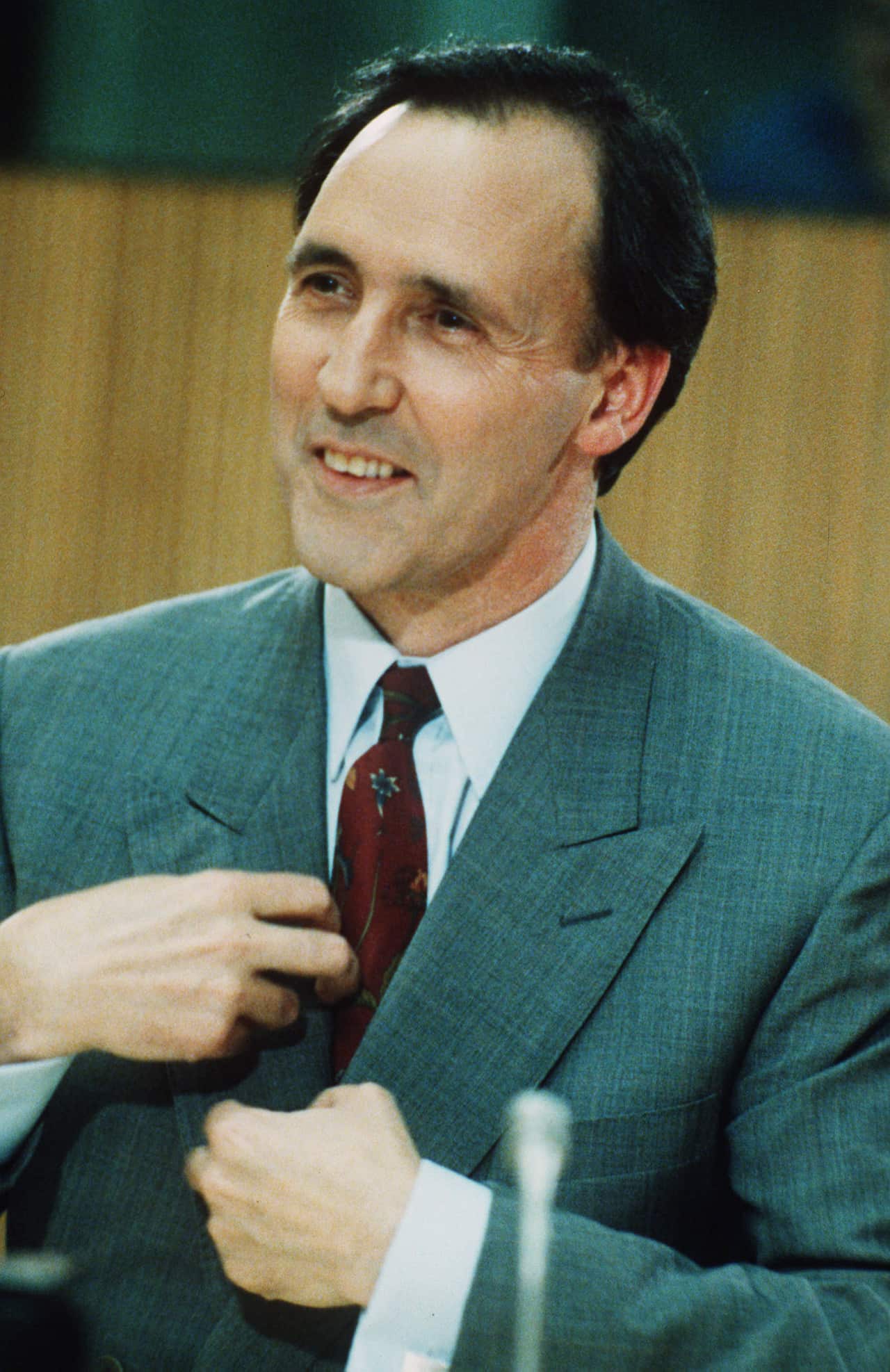 Paul Keating, the new Australian Prime Minister, smiles at a press conference after he defeated Bob Hawke in a close vote.