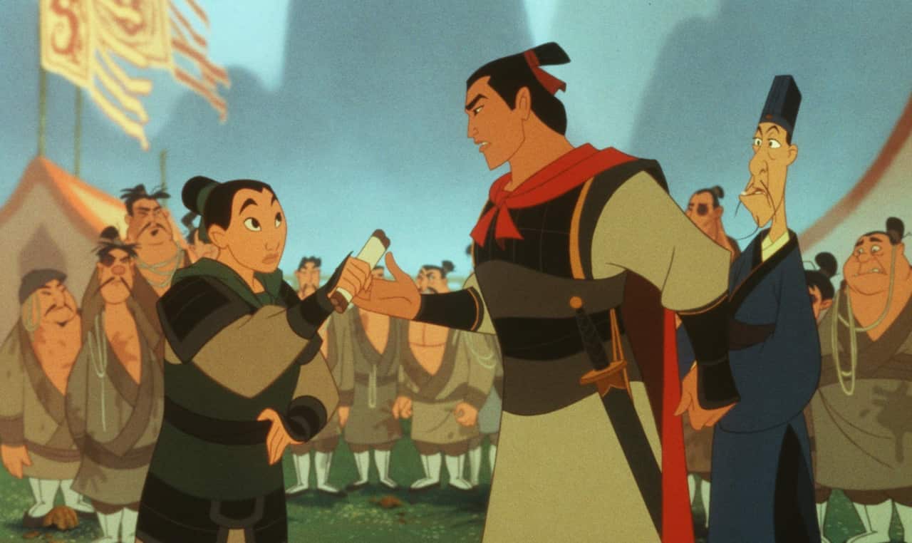 Mulan, left, a brave young Chinese woman secretly disguised as a man, meets her commanding officer, Shang, and tries to convince him that she is just one of the guys in this scene from Walt Disney Pictures' "Mulan."