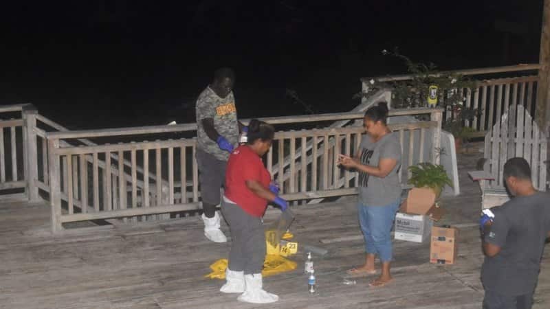 Officers from the Royal Solomon Islands Police Force conducting forensic work at the site of the blast.