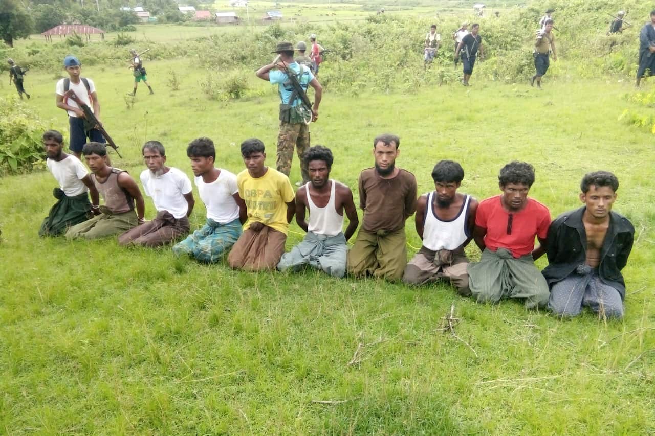 A photograph said to show 10 Rohingya Muslims before their execution in Inn Din village in September. The two Reuters journalists brought the massacre to light.