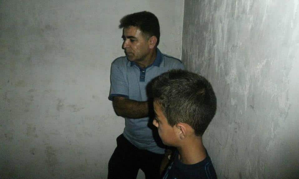 Barzan and one of his sons. (Source: Elle Hardy)