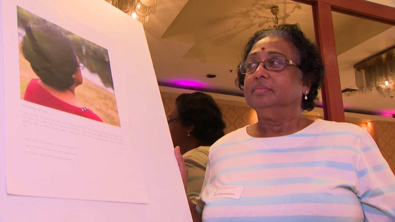 Viji Dhayanathan is one of seventeen women to display her photos at the photovoice exhibit in a bid to curb the stigma surrounding mental illness.