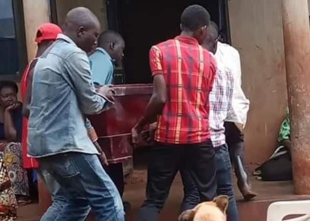 Relatives of Brian Wasswa carry his coffin during his funeral last week.