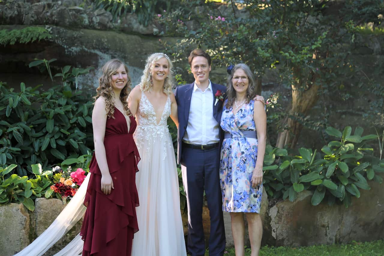Sylvina with husband Mark, her mother and sister.