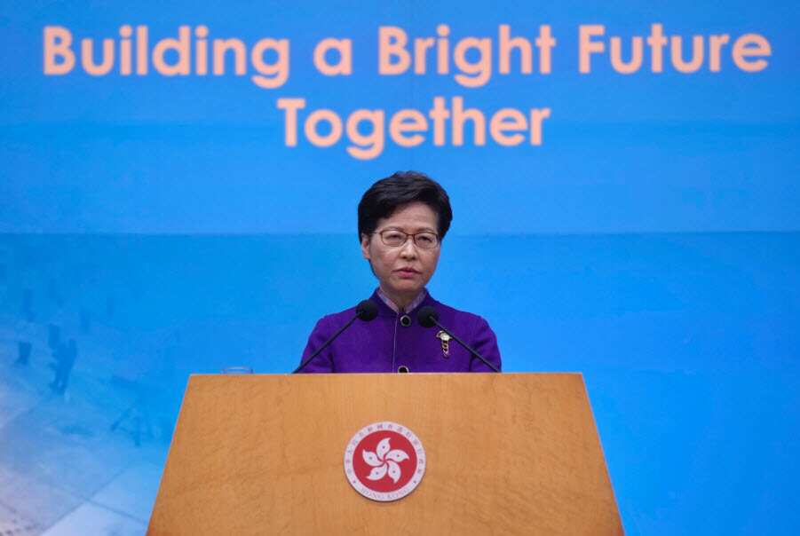 Hong Kong Chief Executive Carrie Lam listens to reporters' questions during a press conference in Hong Kong, Monday, 20 December, 2021. 