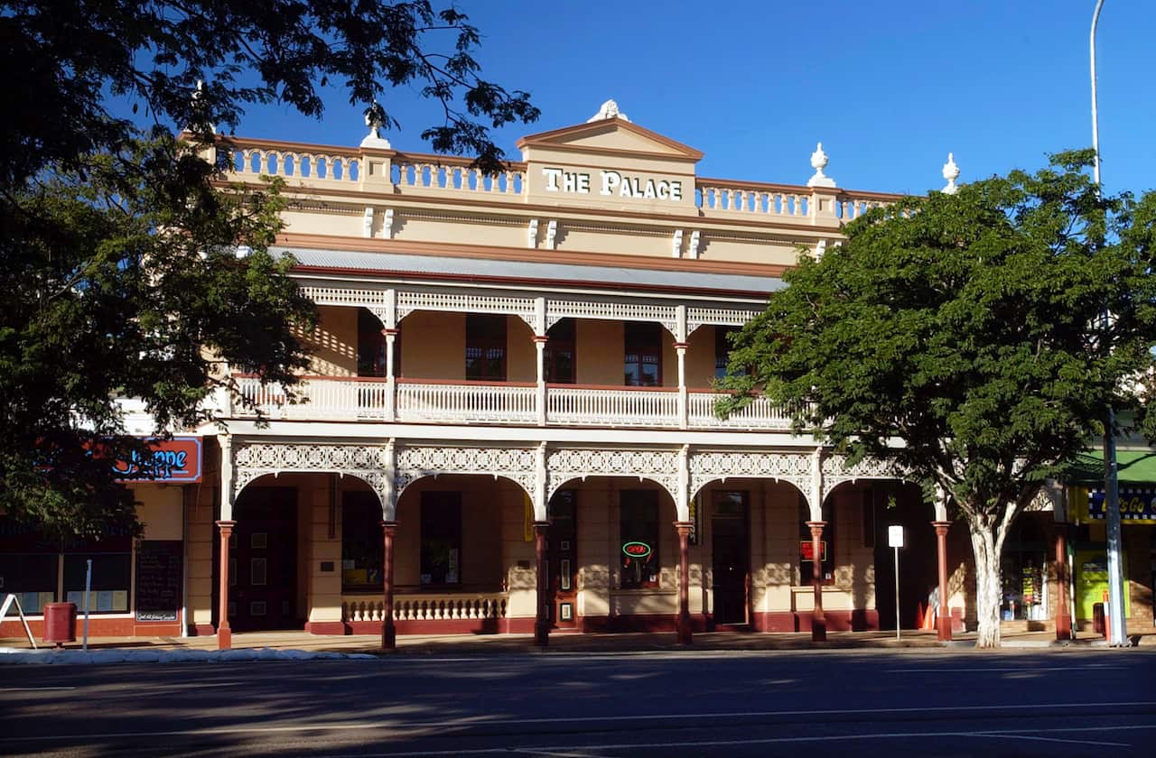 The rebuilt Palace backpackers in Childers in 2004, with its  heritage-listed walls and heat-twisted beams still in place.