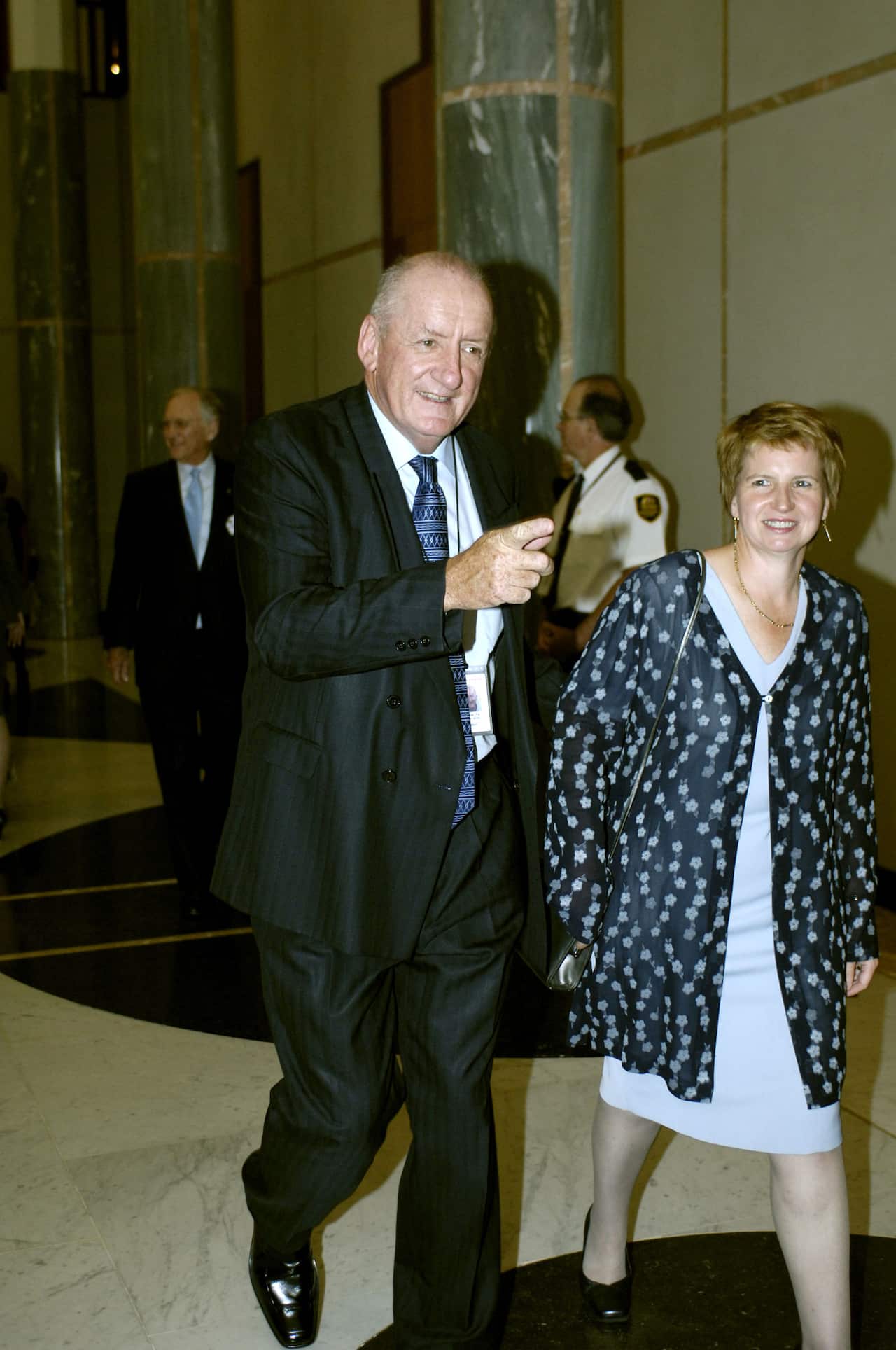 Former Nationals leader Tim Fischer and his wife Judyat the 10th anniversary dinner for the Howard government in Canberra, Wednesday, March 1, 2006. (AAP Image/Alan Porritt) NO ARCHIVING